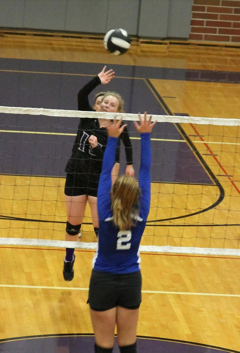 Courtesy photo
Emily Dykes spikes the ball in a recent Mullan volleyball match.