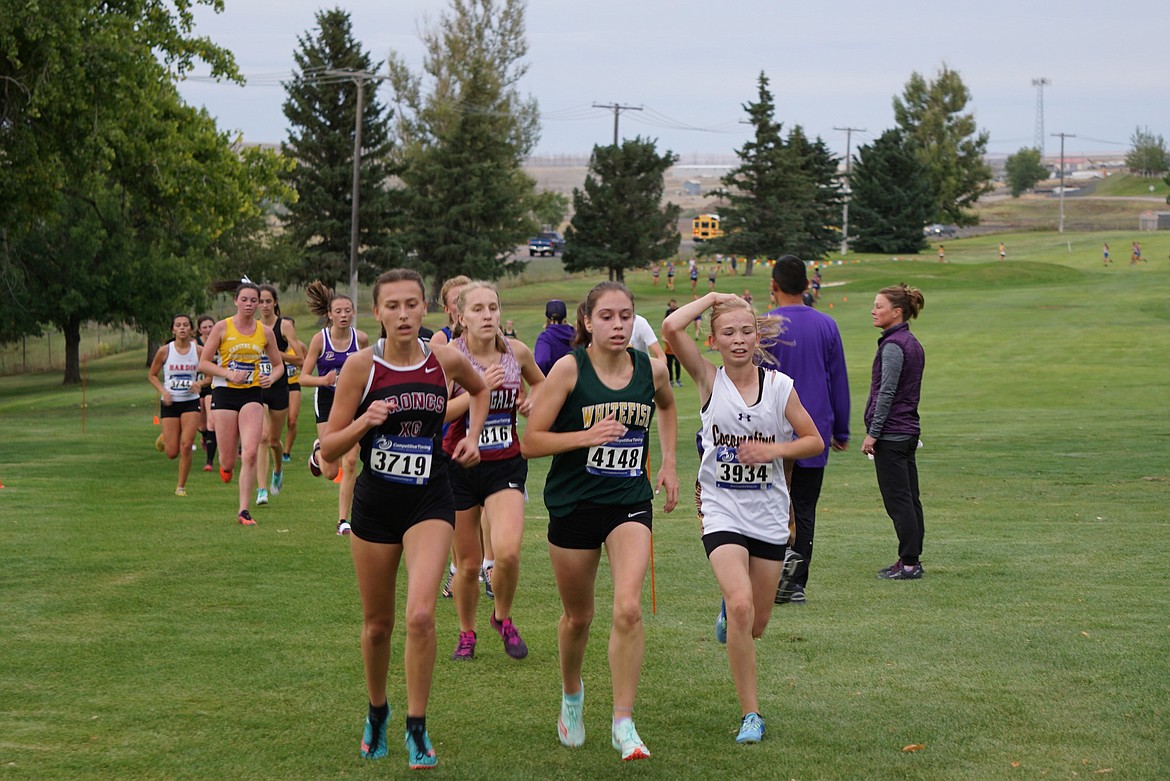 Jessica Henson, center, led the Lady Bulldogs with a time of 20:08.22 at the Great Falls Cross Country Invitational. For more photos, visit www.whitefishpilot.com. (Photo courtesy Matt Weller)