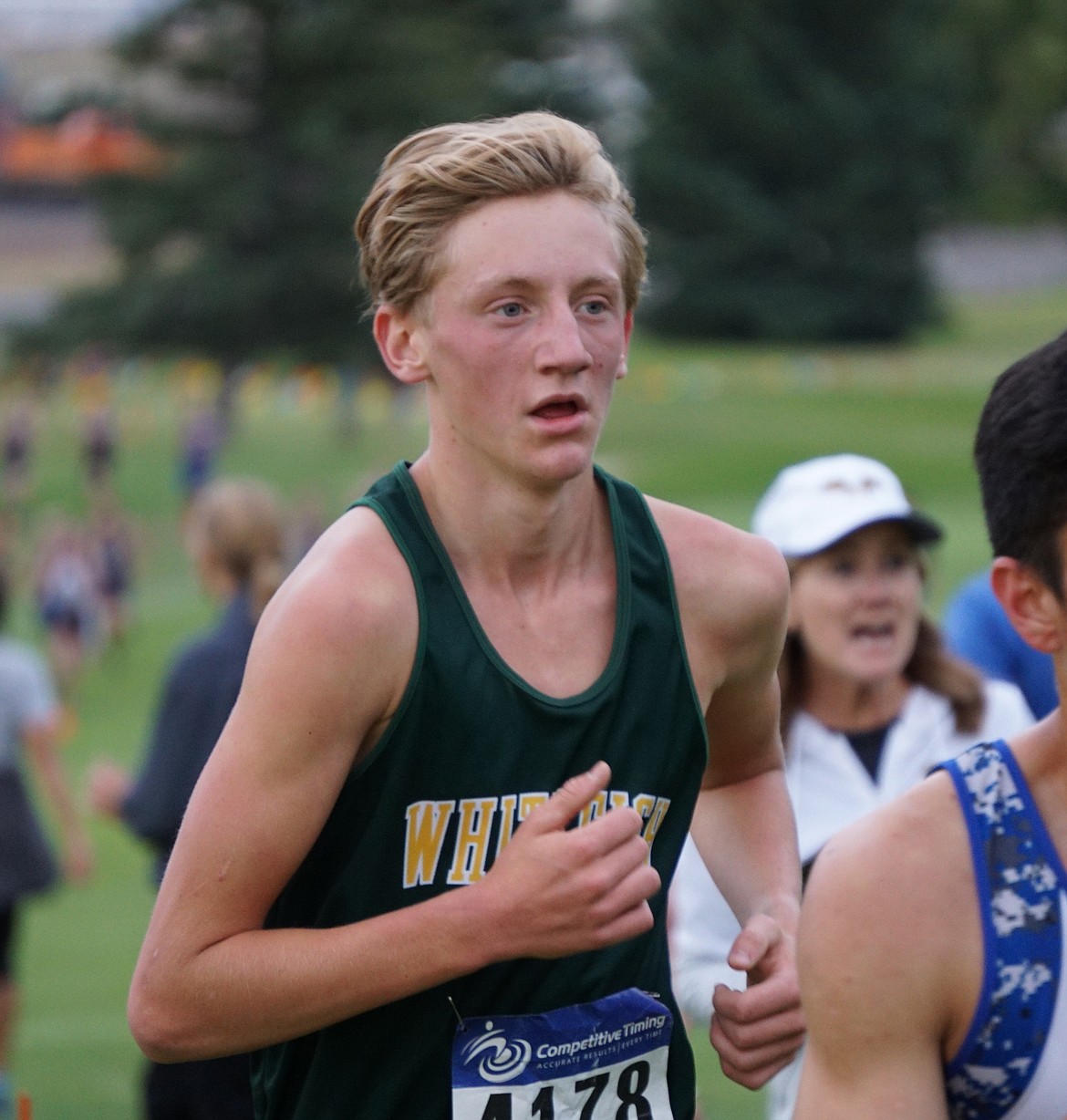 Bulldog Ruedi Steiner runs in the Great Falls Cross Country Invitational. He finished with a time of18:30.13. (Photo courtesy Matt Weller)