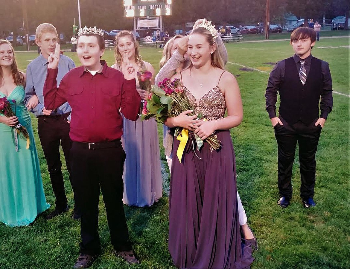 ST. REGIS celebrated Homecoming Friday night with a 52-6 win over Victor. The King is Aiden Sullivan, a freshman, and the Queen is Kylee Thompson, a senior. Other members of the court were Kylie Lucier, freshman; Abbie Lowry, sophomore; Grace King, junior; William Lowry, soph; Jake Lowman, junior; and Zech Flandreau, senior. (Chuck Bandel/Mineral Independent)