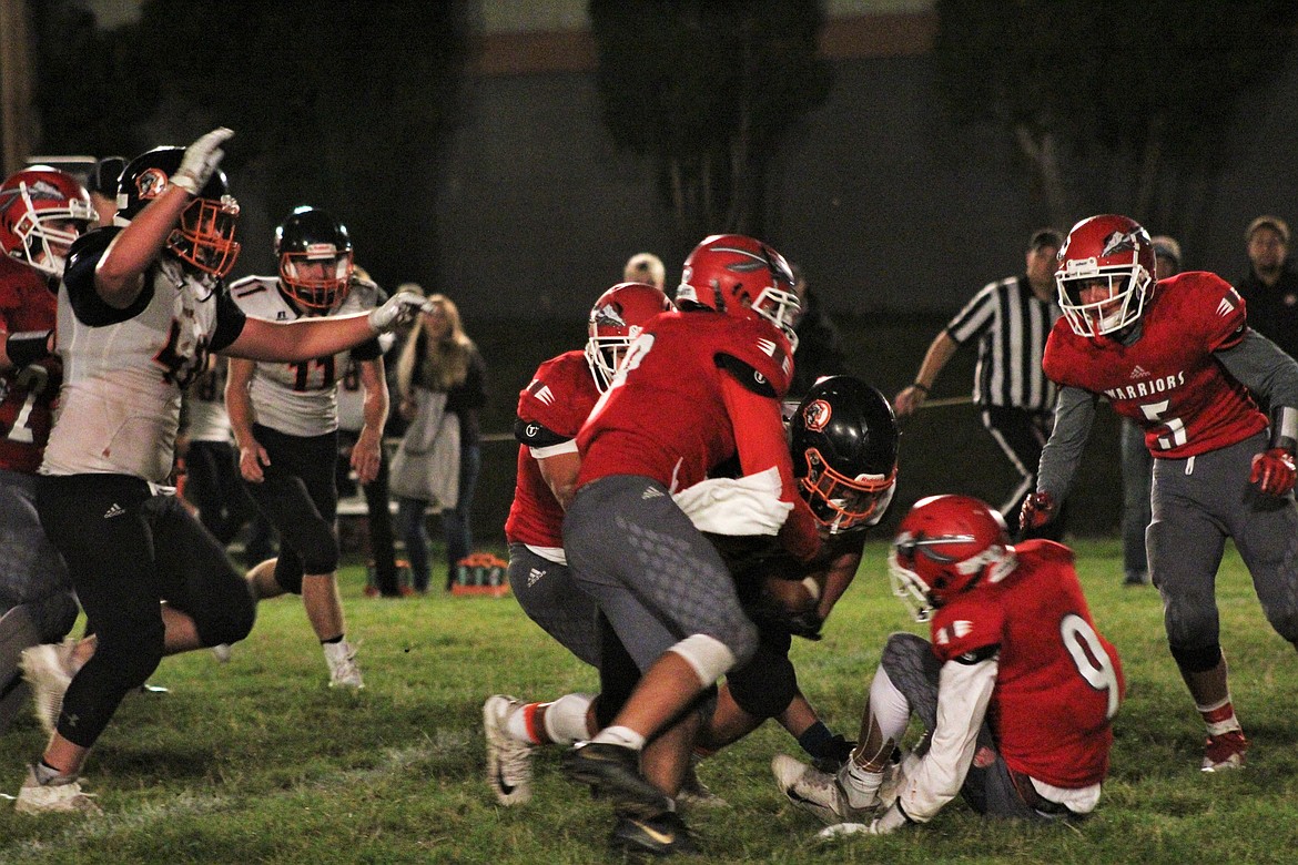 THE ARLEE defense making a tackle, stopping Plains in their tracks. (John Dowd/Clark Fork Valley Press)