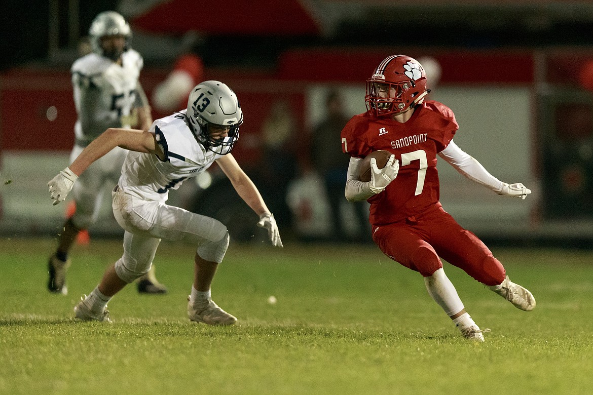 (Photo courtesy of JASON DUCHOW PHOTOGRAPHY)
Senior wide receiver Christian Niemela evades a Lake City defender during the game Friday. Niemela was named homecoming king at halftime and had eight catches for 123 yards and two touchdowns in the game.