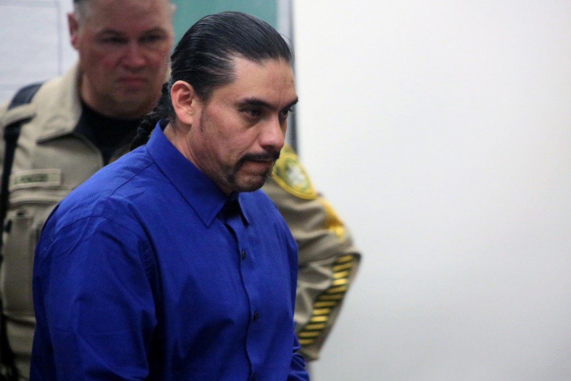 Emry Dinman/Columbia Basin Herald Gustavo Tapia Rodriguez walks across the courtroom Monday. He is facing charges of, among others, kidnapping and murder in the case of Arturo Sosa. Tapia Rodrguez is already serving a life sentence after being convicted of murder in another case that concluded earlier this year.