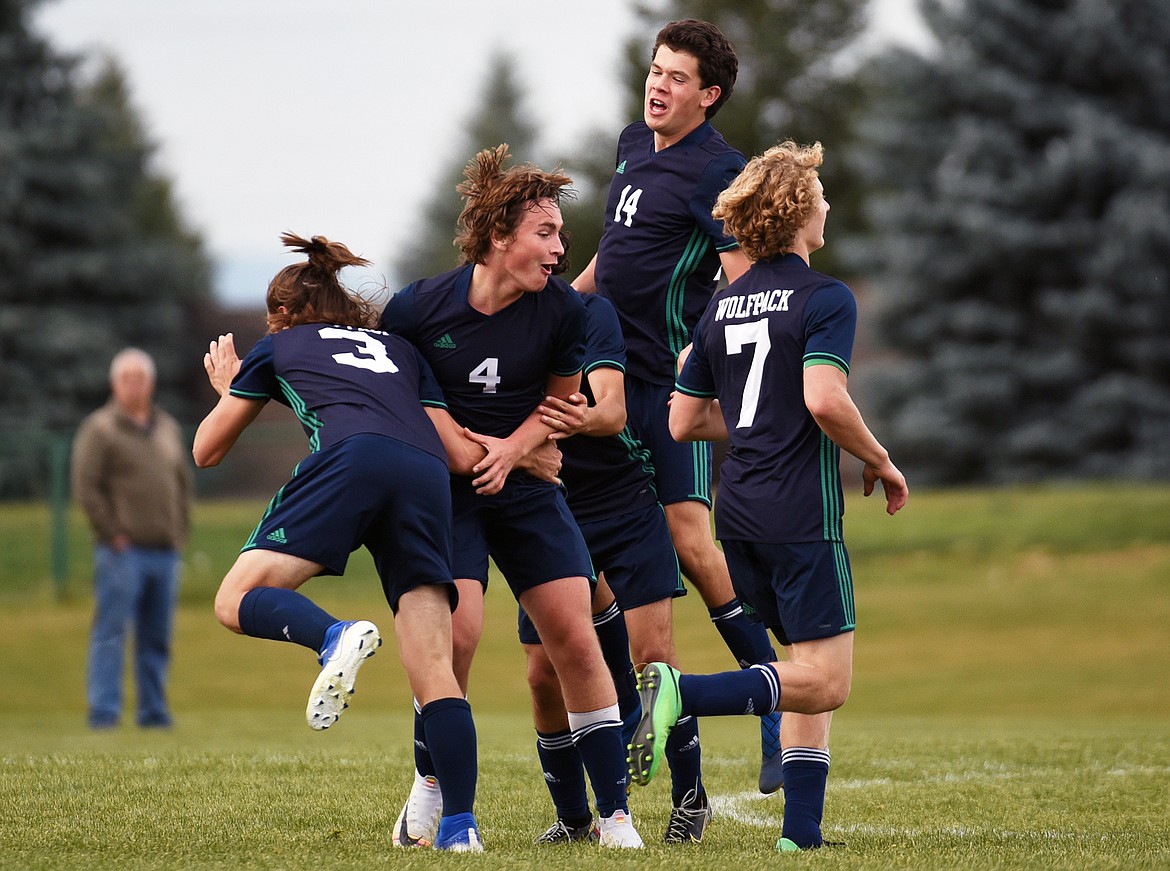 Glacier celebrates after Braden Nitschelm's (4) second-half goal against Missoula Hellgate at Glacier High School on Thursday. (Casey Kreider/Daily Inter Lake)