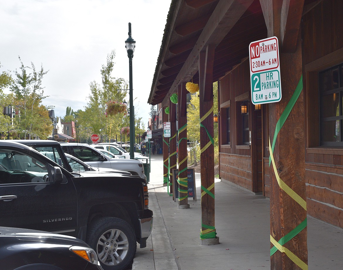 Cars parked along Central Avenue in downtown Whitefish. (Heidi Desch/Whitefish Pilot)