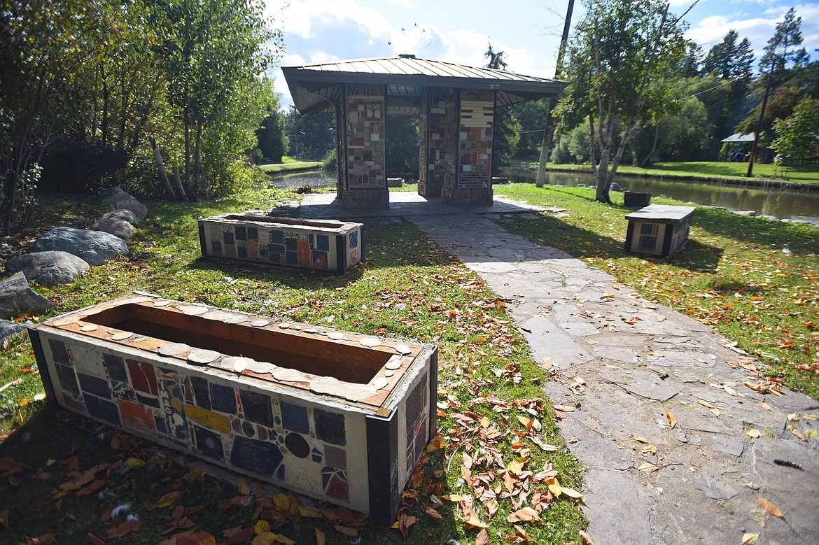 Stone slabs were removed from the tops of two of the four benches and broken during recent vandalism to the Community Spirit Monument at Woodland Park in Kalispell on Wednesday, Oct. 2. (Casey Kreider/Daily Inter Lake)