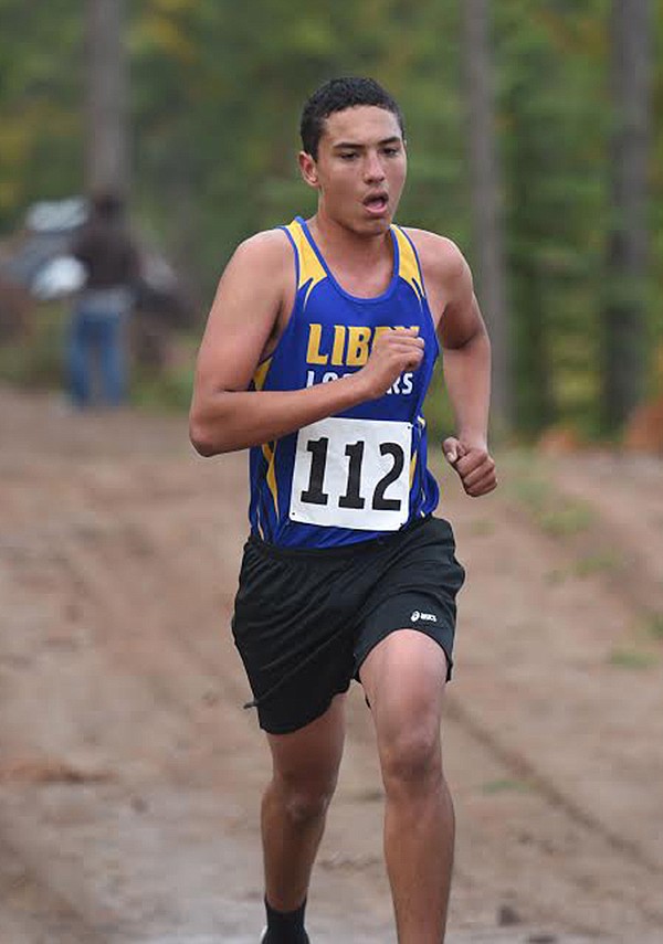 Libby sophomore Lucky Martin ran a personal best on the Flower Creek course. (Tana Wilson/The Western News)