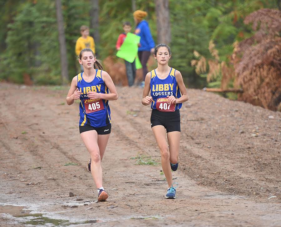 Libby&#146;s Halona LaFeur (405), and Aurora Smith (407) set their pace together Saturday at the Wilderness Run. LaFleur was second and Smith third. (Tana Wilson/The Western News)