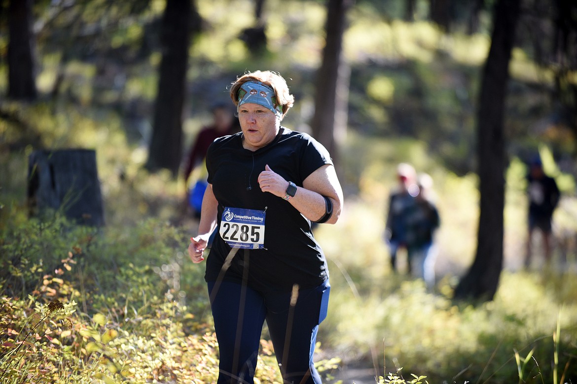 Marla Nelson of Kalispell runs in the 5k Sunday morning during the Whitefish Trail Legacy Run. (Heidi Desch/Whitefish Pilot)