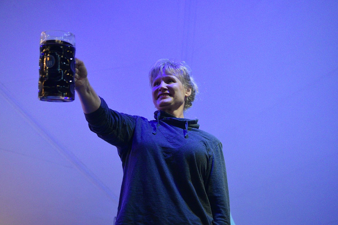 Kim Janiszewski competes in the ladies stein-holding competition Thursday night at the Great Northwest Oktoberfest. The festival continues Oct. 3-5 at Smith Fields. (Heidi Desch/Whitefish Pilot)