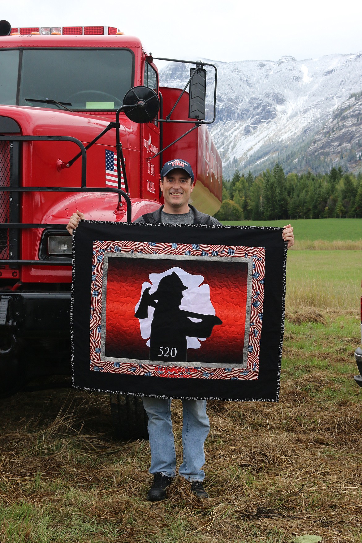 Hall Mountain Firefighter and Training Officer Wally Nyberg (left photo) and Hall Mountain Firefighter Ben Allinger with their quilts.