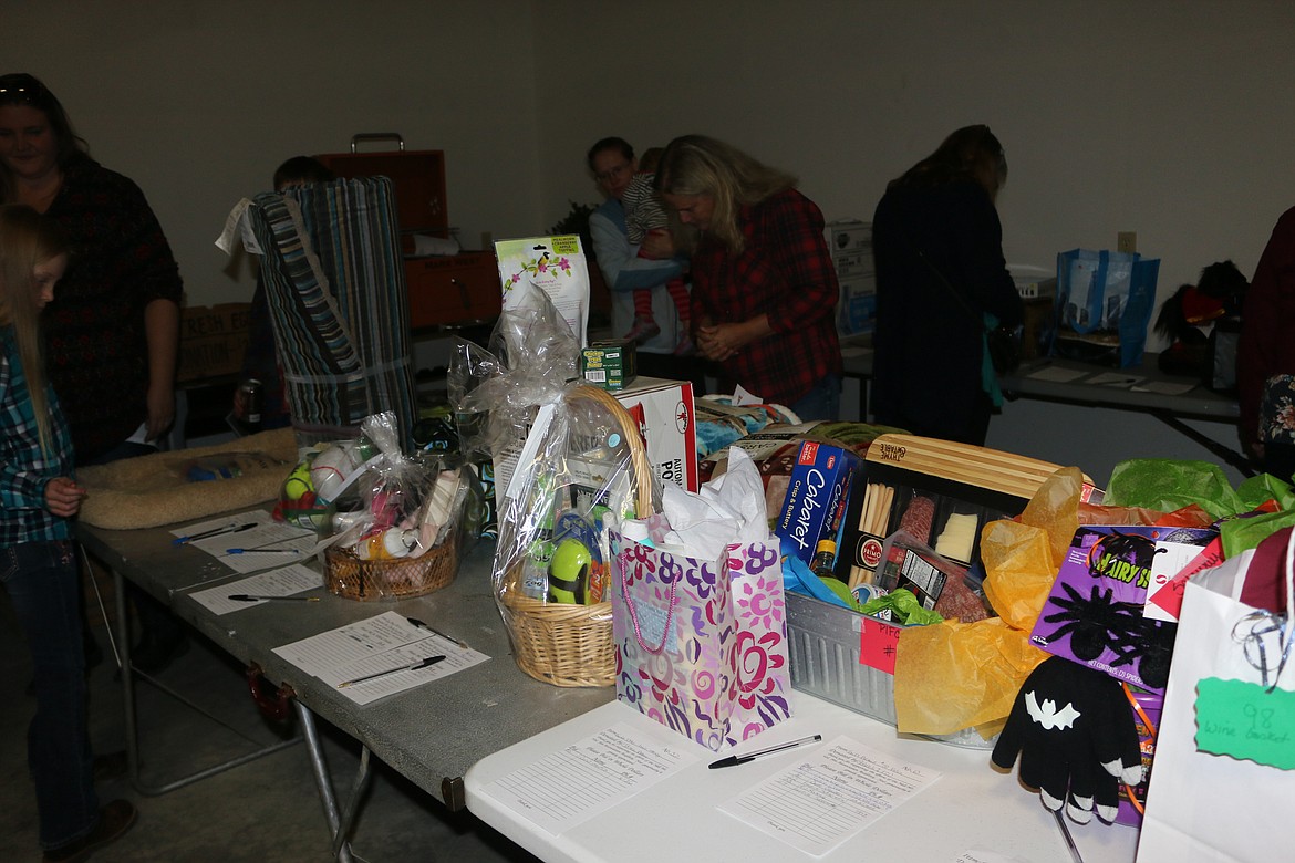 Photo by MANDI BATEMAN
There was a wide array of items and gift certificates available for people to bid on in the silent auction.