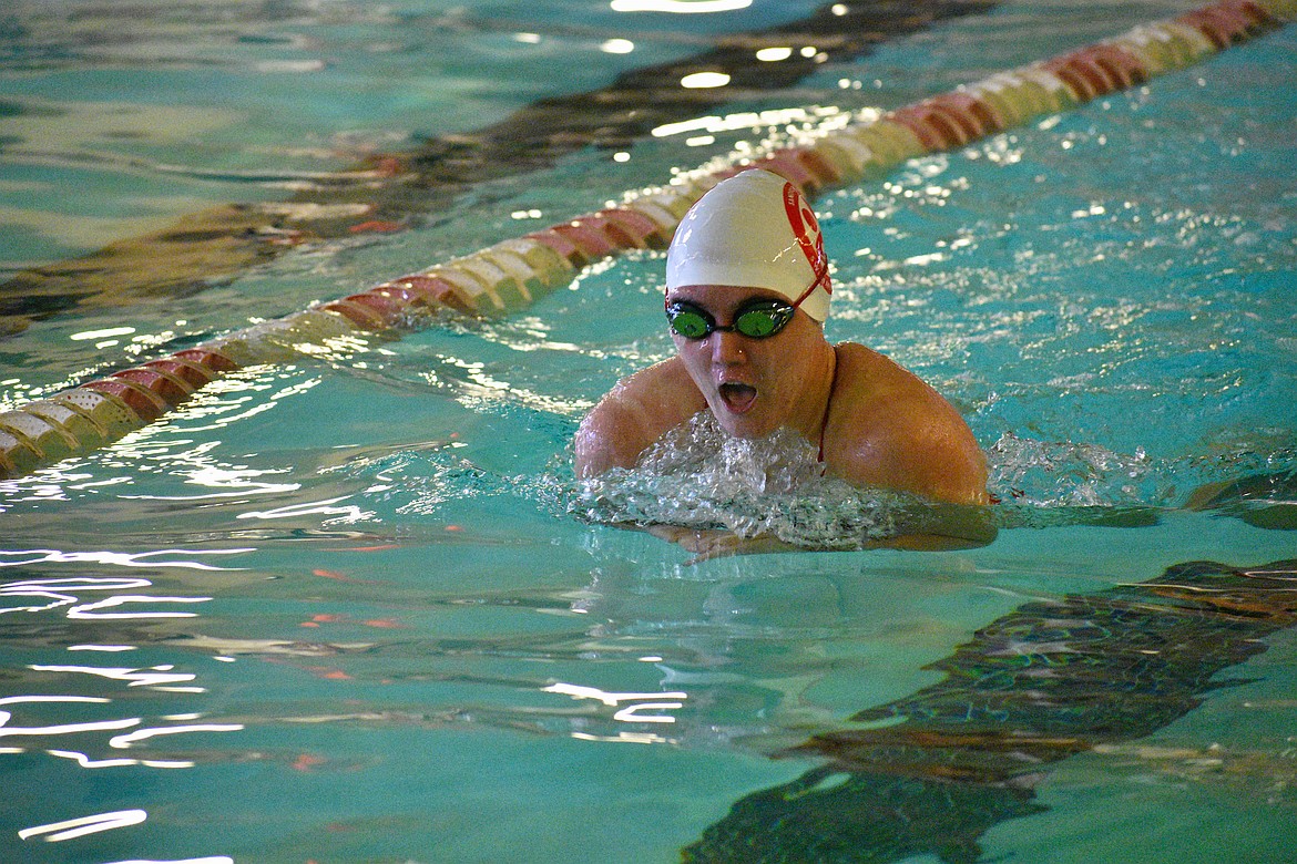 (Photo by DYLAN GREENE)
Junior Kate Bokowy swims the breaststroke portion of the girls 200 individual medley Saturday.