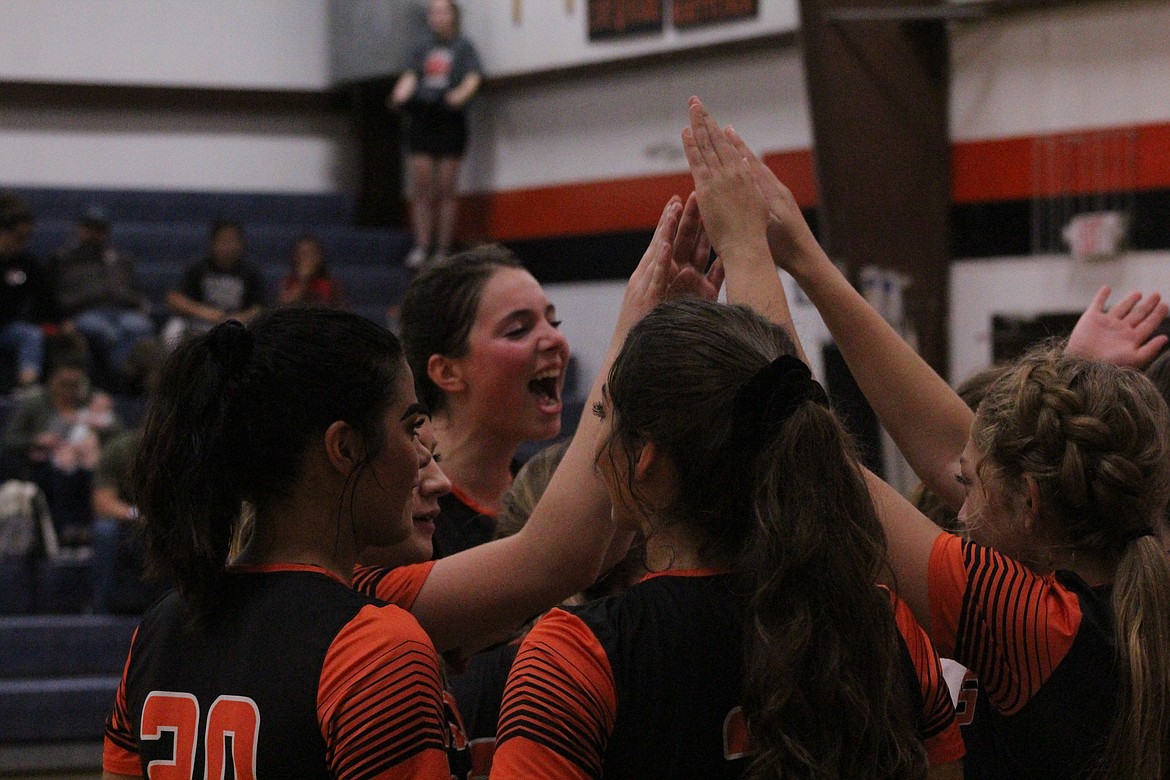 THE TROTTERS volleyball team celebrates after another close point earned against Arlee, last Thursday. (John Dowd/Clark Fork Valley Press)