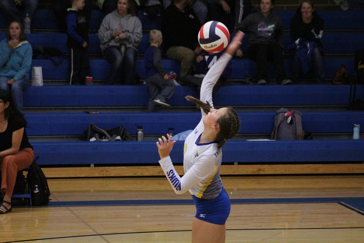 ELLISON PARDEE 
serving to Arlee last Saturday in Thompson Falls volleyball match against the Scarlets. (John Dowd/Clark Fork 
Valley Press)