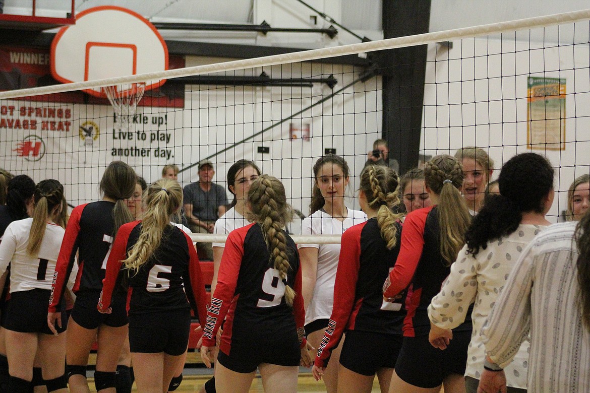 HOT SPRINGS and Lincoln shaking hands after their match, last Tuesday. (John Dowd/Clark Fork Valley Press)