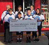 Enterprising youth donates summer proceeds toward rink