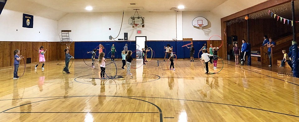 THE TROUT Creek Hula For Harlee fundraiser kids show off their hula hoop skills. (Photo credit Debbie Phillips/Clark Fork Valley Press)