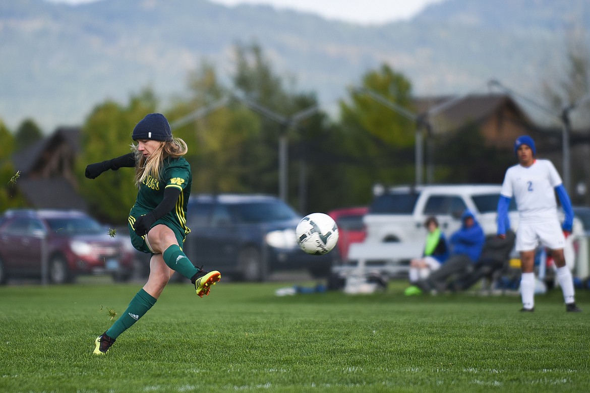 Niath Edland fires a shot during Saturday&#146;s homecoming win over Libby. (Daniel McKay/Whitefish Pilot)
