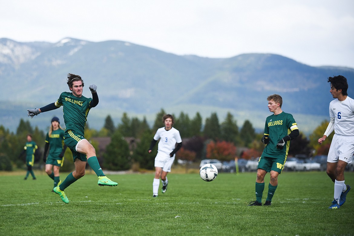Sam Menicke nails a shot during Saturday&#146;s homecoming win over Libby. (Daniel McKay/Whitefish Pilot)