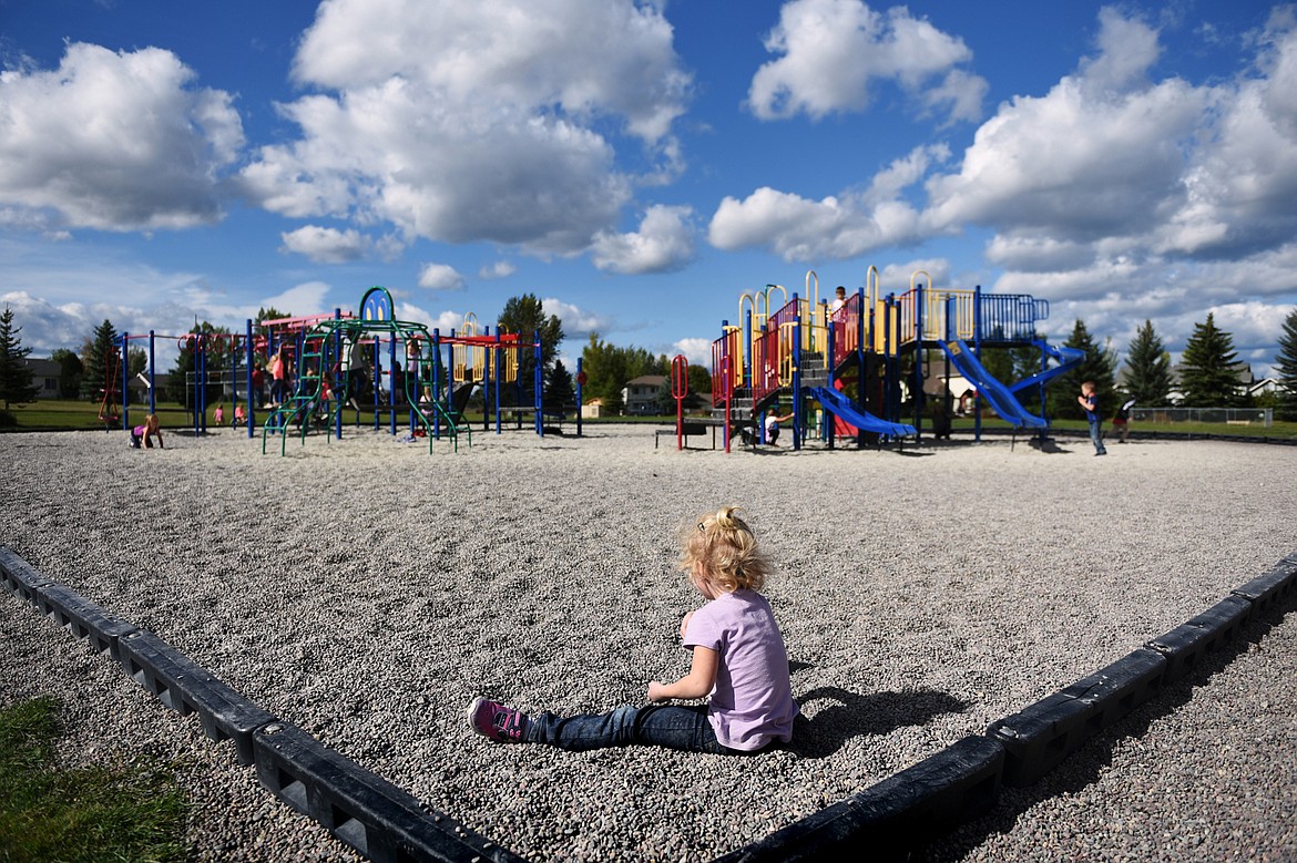 First-grade students play on playground equipment during recess at Edgerton Elementary School in Kalispell on Tuesday, Sept. 24. (Casey Kreider/Daily Inter Lake)