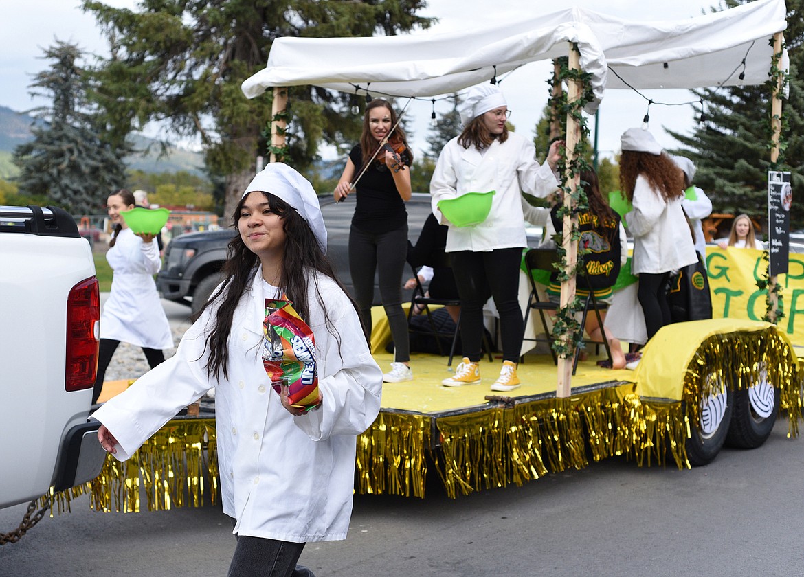 The Lady Bulldog team, dressed as chefs, was &#147;serving up a victory&#148; for the Whitefish High School homecoming parade Friday afternoon through downtown. (Heidi Desch/Whitefish Pilot)