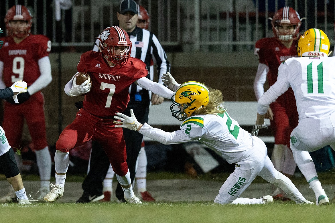 (Photo courtesy of JASON DUCHOW PHOTOGRAPHY)
Senior wide receiver Christian Niemela stiff arms a Lakeland defender in his final home game as a Bulldog on Friday night.