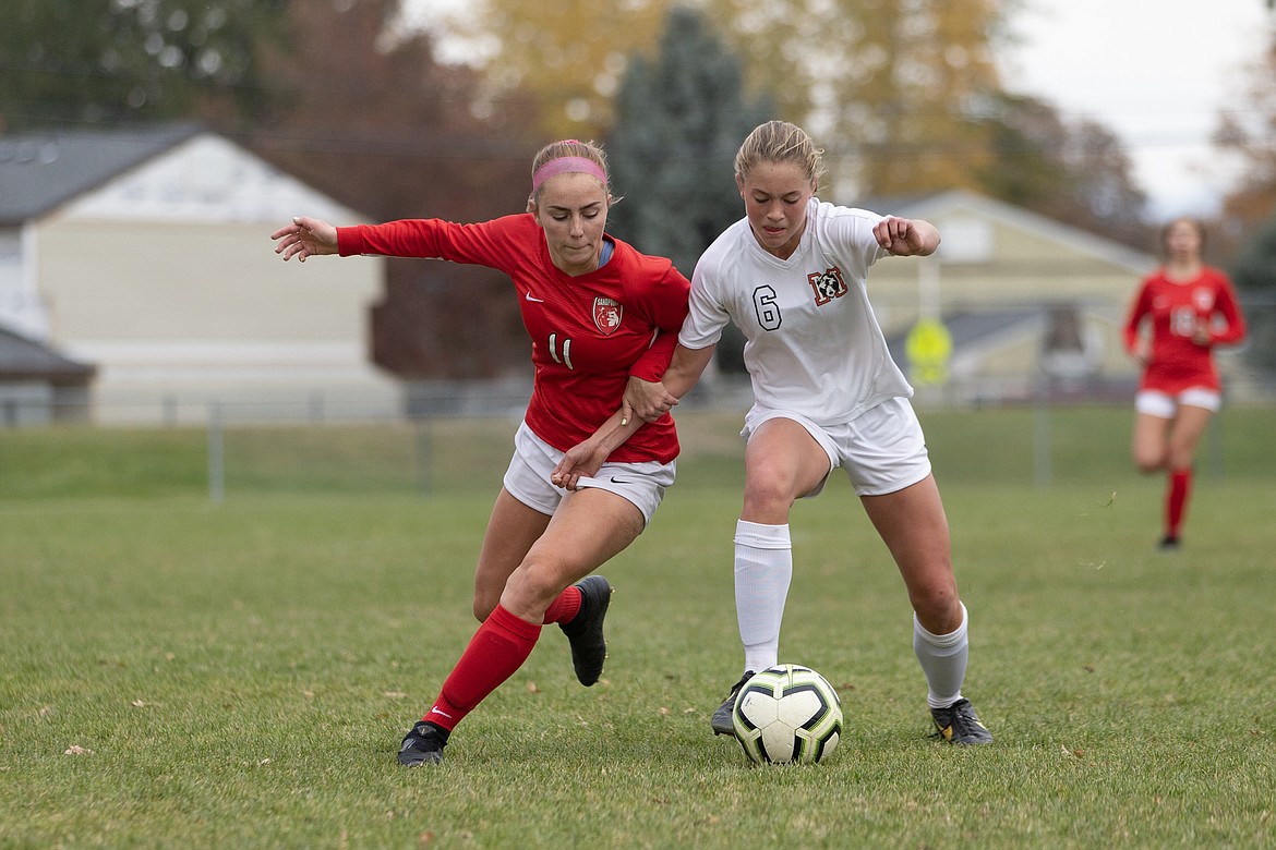 (Photo courtesy of JASON DUCHOW PHOTOGRAPHY) 
Senior forward Emi Lynch tries to fight past a Moscow defender during the match Wednesday.