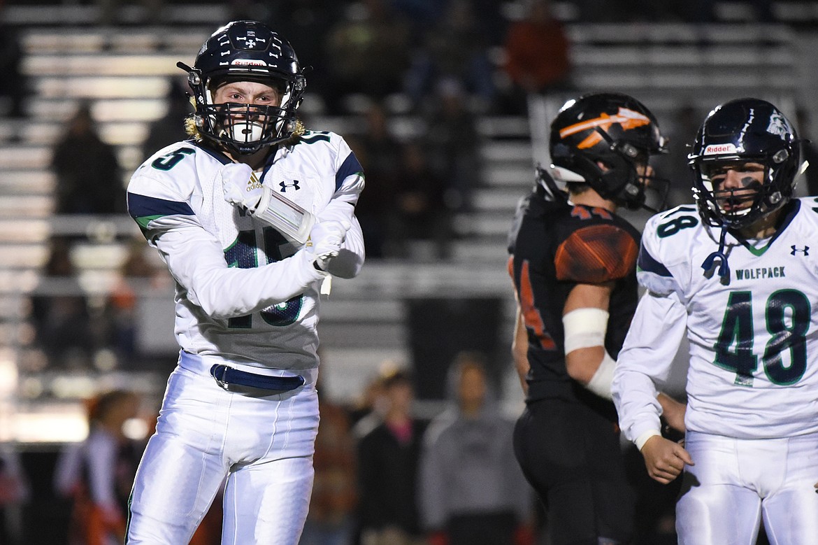 Glacier linebacker Hunter Karlstad (15) celebrates after a second-quarter sack of Flathead quarterback Charlie Hinchey (9) during a crosstown matchup at Legends Stadium on Friday. (Casey Kreider/Daily Inter Lake)