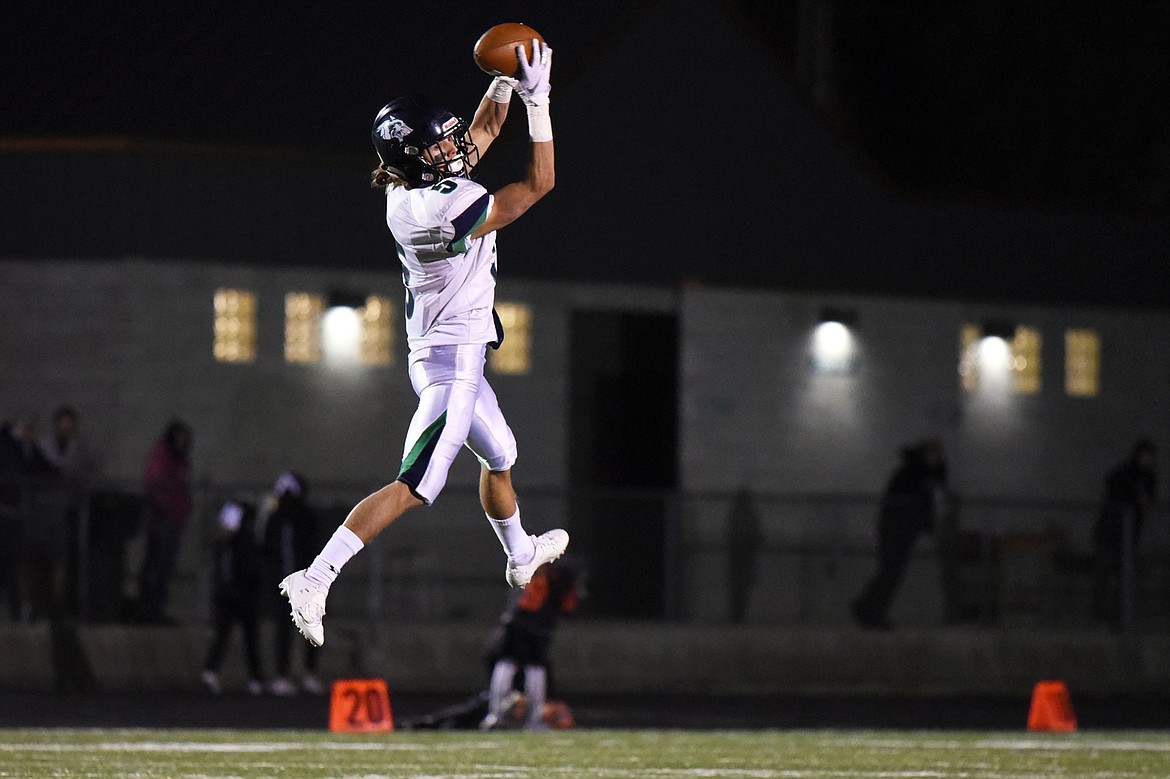 Glacier wide receiver Drew Deck (5) pulls down a reception in the second quarter against Flathead during a crosstown matchup at Legends Stadium on Friday. (Casey Kreider/Daily Inter Lake)