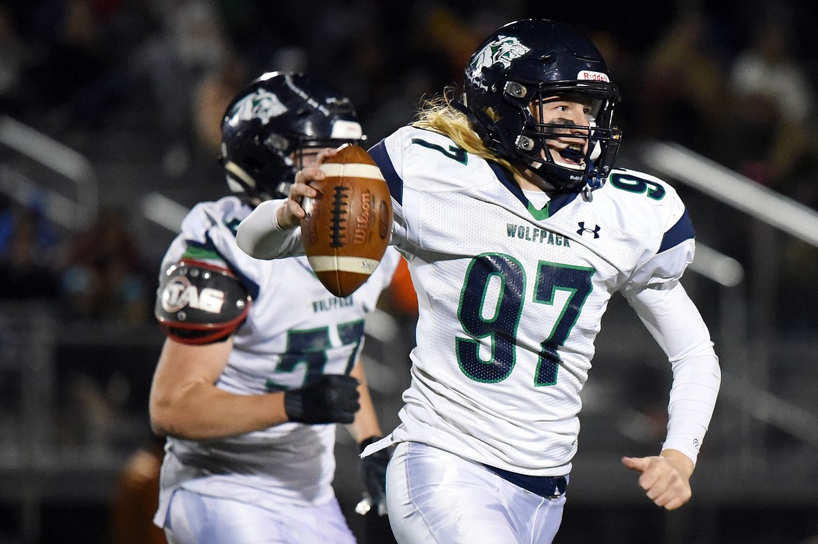 Glacier's Thomas Cole (97) celebrates after recovering a fumble in the second quarter against Flathead during a crosstown matchup at Legends Stadium on Friday. (Casey Kreider/Daily Inter Lake)