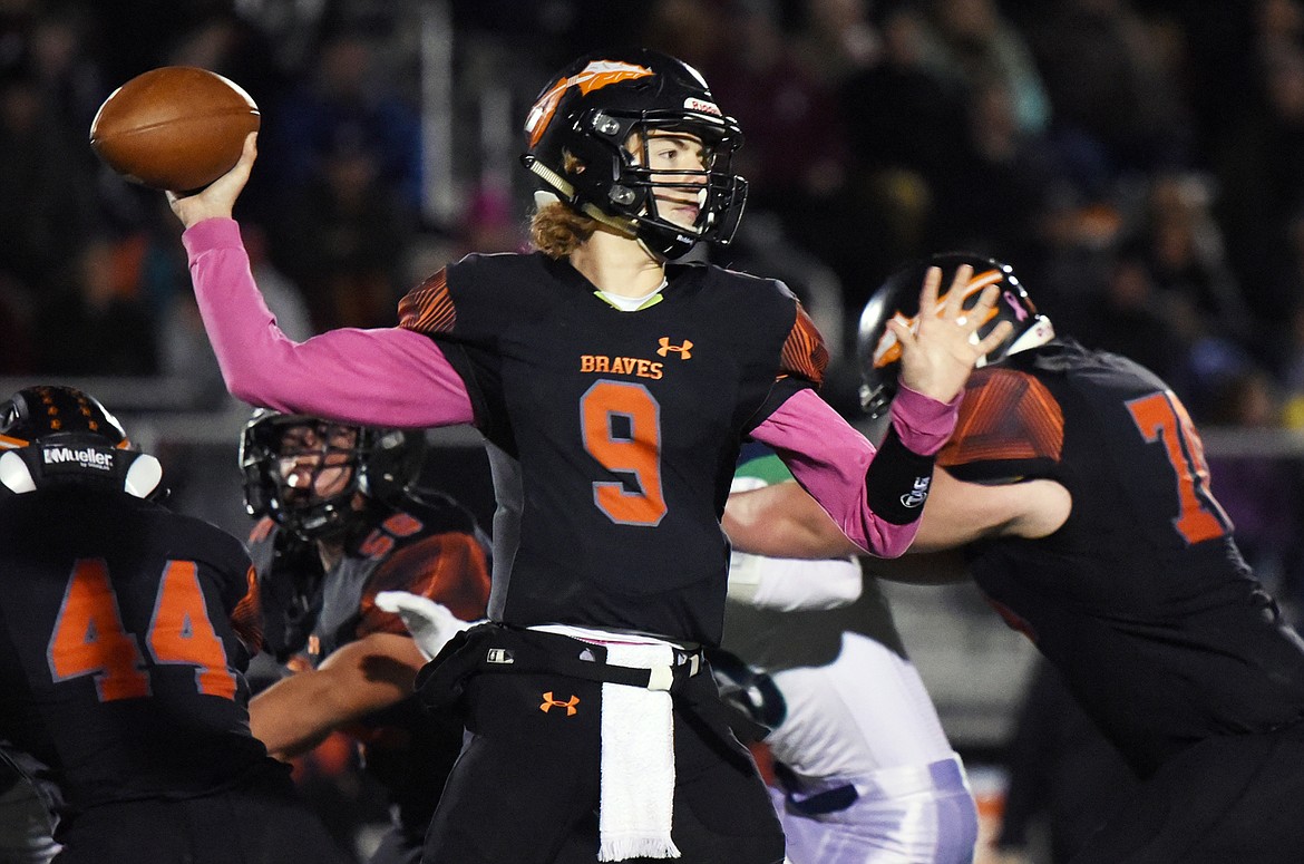 Flathead quarterback Charlie Hinchey (9) looks to throw in the second half against Glacier during a crosstown matchup at Legends Stadium on Friday. (Casey Kreider/Daily Inter Lake)