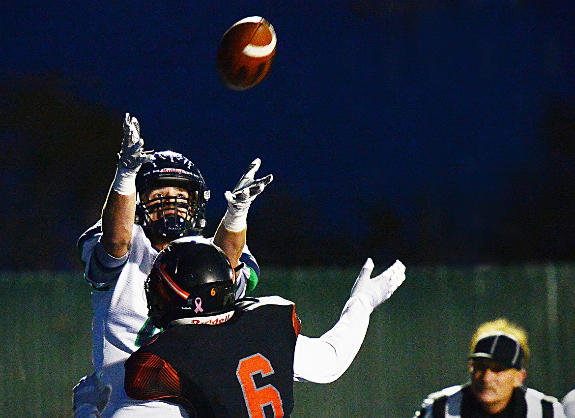 Glacier tight end Luke Bilau (4) hauls in a first quarter touchdown reception against Flathead during a crosstown matchup at Legends Stadium on Friday. (Casey Kreider/Daily Inter Lake)