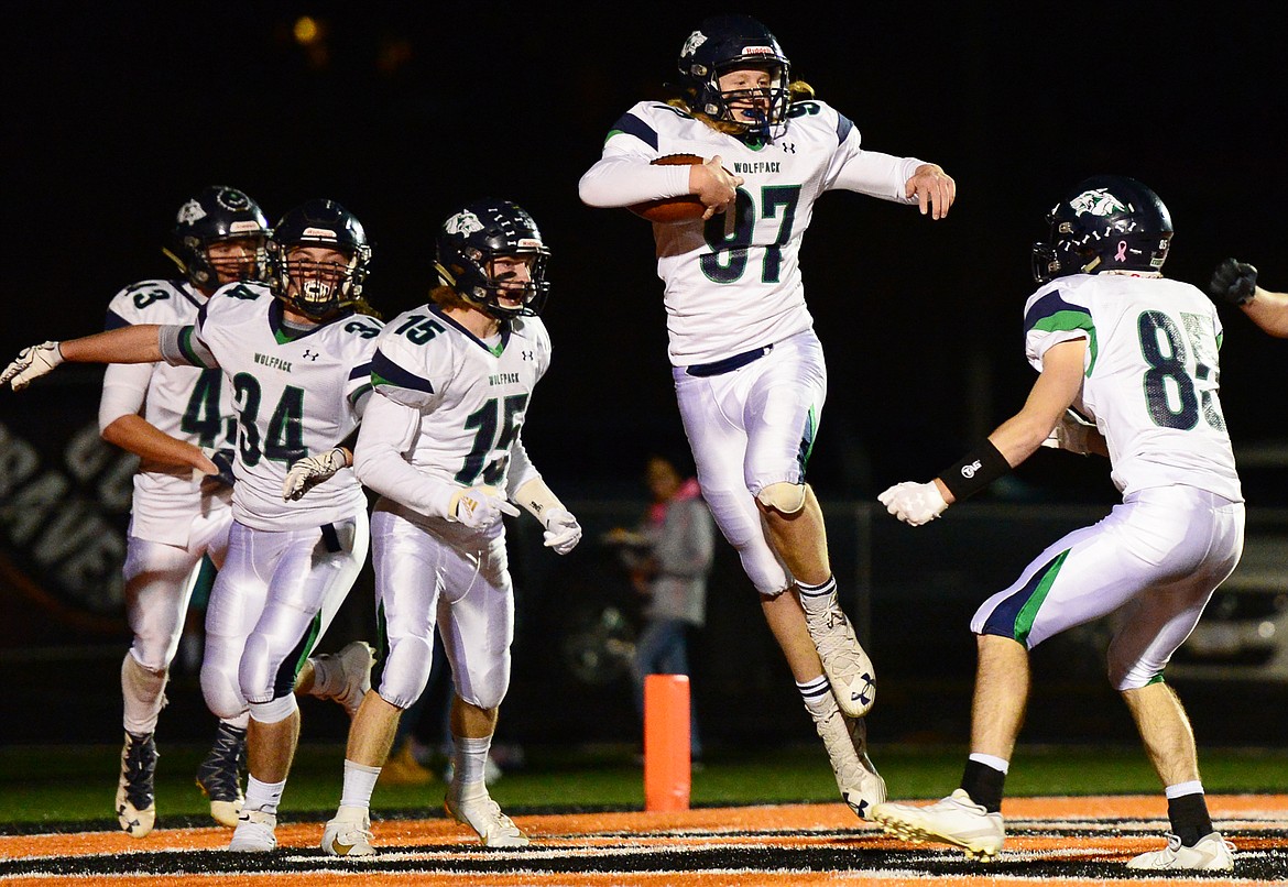 Glacier defensive lineman Thomas Cole (97) celebrates with teammates after returning a fumble for a touchdown against Flathead during a crosstown matchup at Legends Stadium on Friday. (Casey Kreider/Daily Inter Lake)