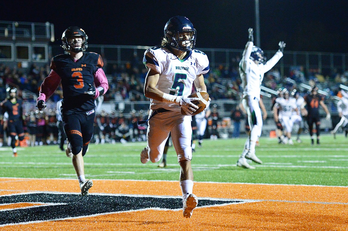 Glacier wide receiver Drew Deck (5) catches an 18-yard touchdown pass in the third quarter against Flathead during a crosstown matchup at Legends Stadium on Friday. (Casey Kreider/Daily Inter Lake)