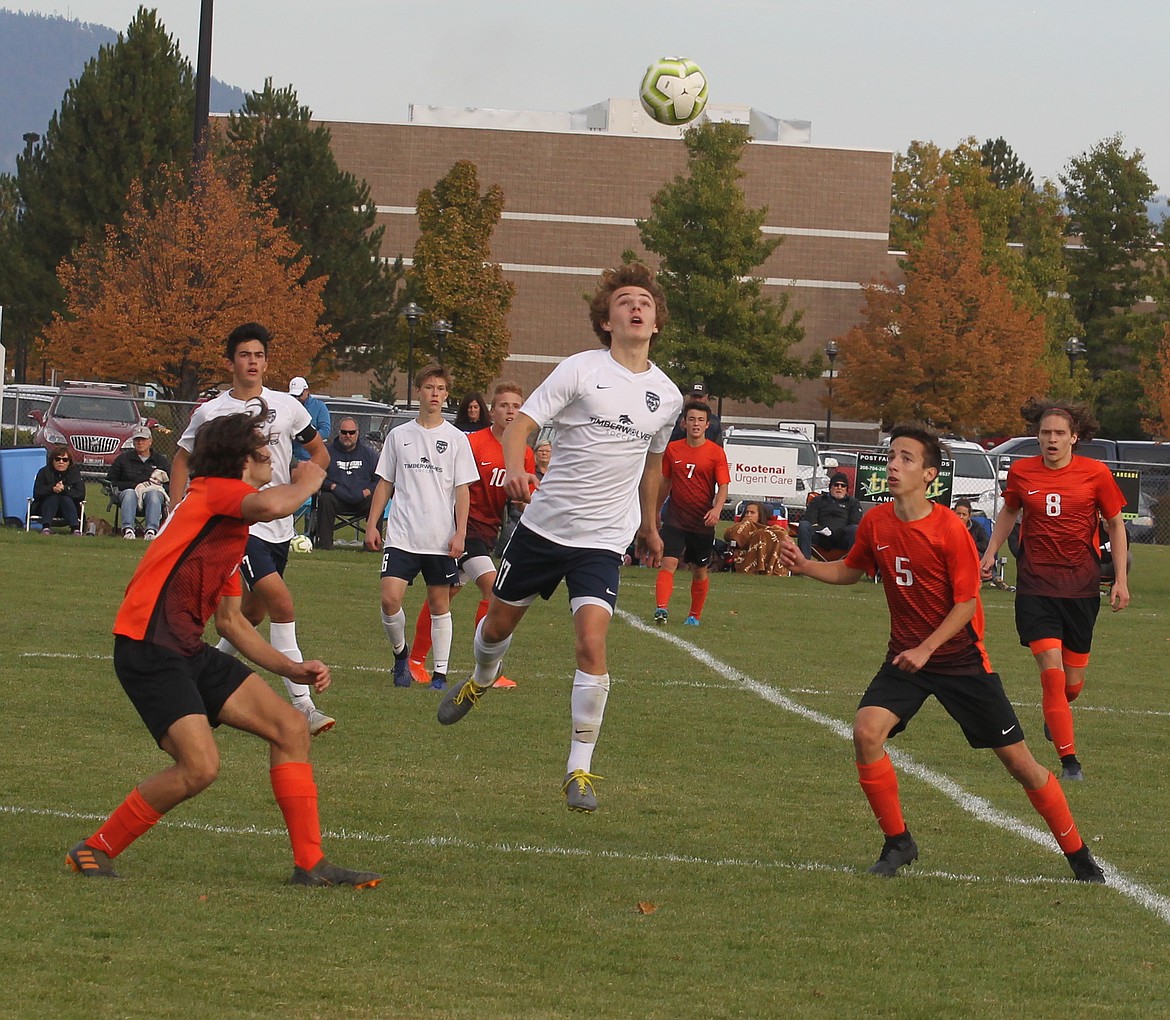 JASON ELLIOTT/Press
Lake City midfielder Kohrt Weber attempts to head the ball out of the Post Falls defense during the second half of Saturday&#146;s 5A Region 1 boys soccer match at Post Falls High.