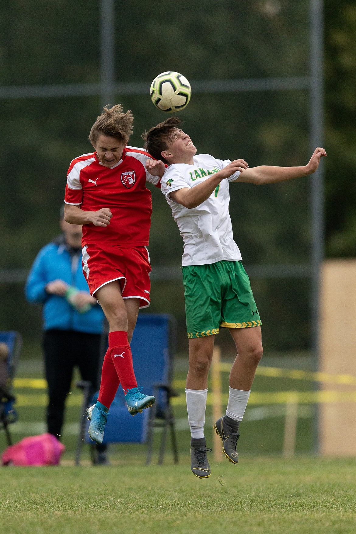 (Photo courtesy of JASON DUCHOW PHOTOGRAPHY)
Sophomore defender Aidan Smith nearly collides heads with a Lakeland player while hitting a header Tuesday at Pine Street Field.