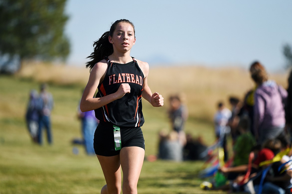 Flathead's Tori Noland-Gillespie heads down the home stretch at the Glacier Invite at Rebecca Farm on Wednesday. Noland-Gillespie placed second in the girls' race. (Casey Kreider/Daily Inter Lake)