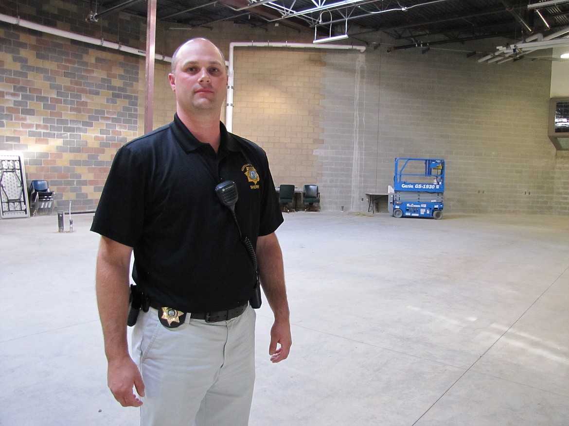 Lt. Kyle Hutchison stands inside one of two &#147;shells&#148; built to eventually house 54 inmates. (KEITH ERICKSON/Press)