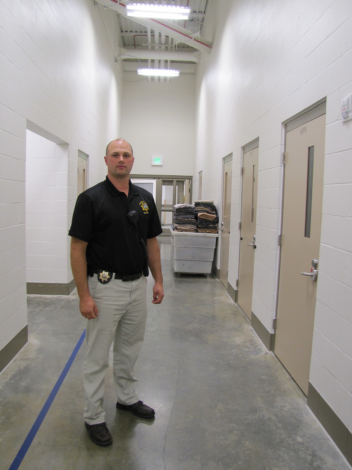 Lt. Hutchison in a jail hallway.  (KEITH ERICKSON/Press)