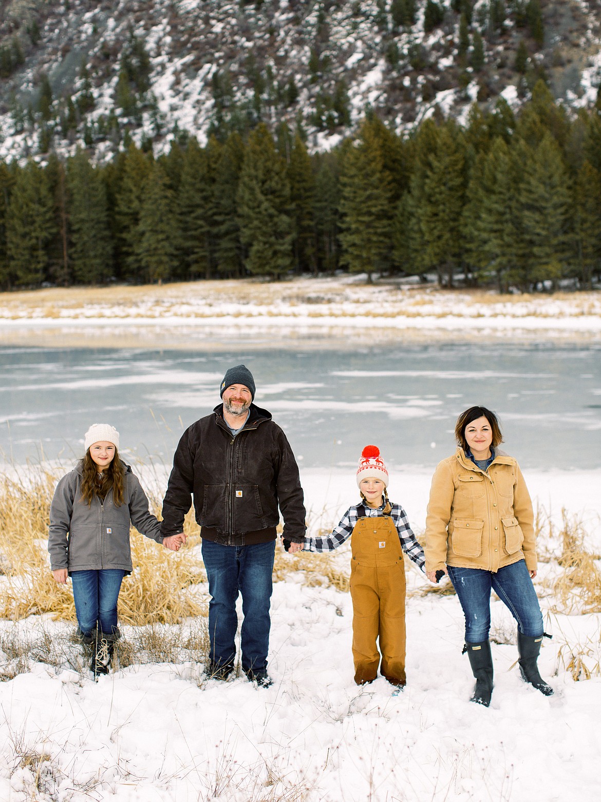 The Dorr family is pictured on their farm from left to right: Elaina, 11, Casey, Evelynne, 9, and Alyson.
(Courtesy of Jeremiah and Rachel Spray Photography)