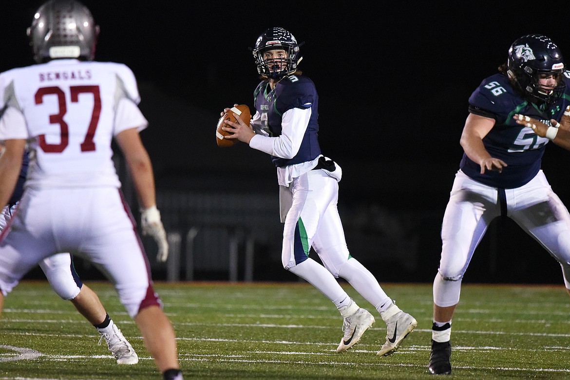 Glacier quarterback JT Allen (3) looks to pass in the first half against Helena at Legends Stadium on Friday. (Casey Kreider/Daily Inter Lake)