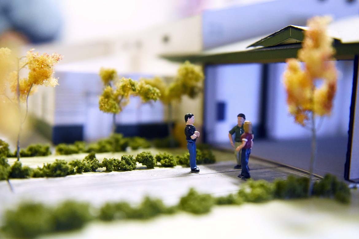 Figurines are shown outside a model of the activity center at Stillwater Free Lutheran Church in West Valley.