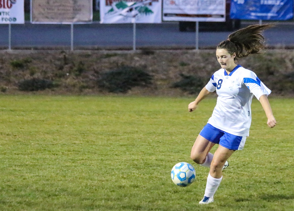 Lily Blackmore dribbles the ball upfield against Timberlake.