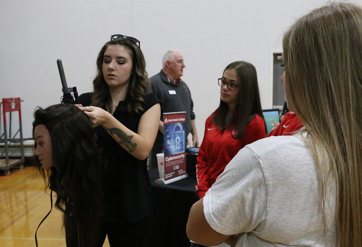 (Photo by MARY MALONE)
Toni &amp; Guy Hairdressing Academy was one of many programs represented at North Idaho College's CTE Roadshow, held at Sandpoint High School on Friday.