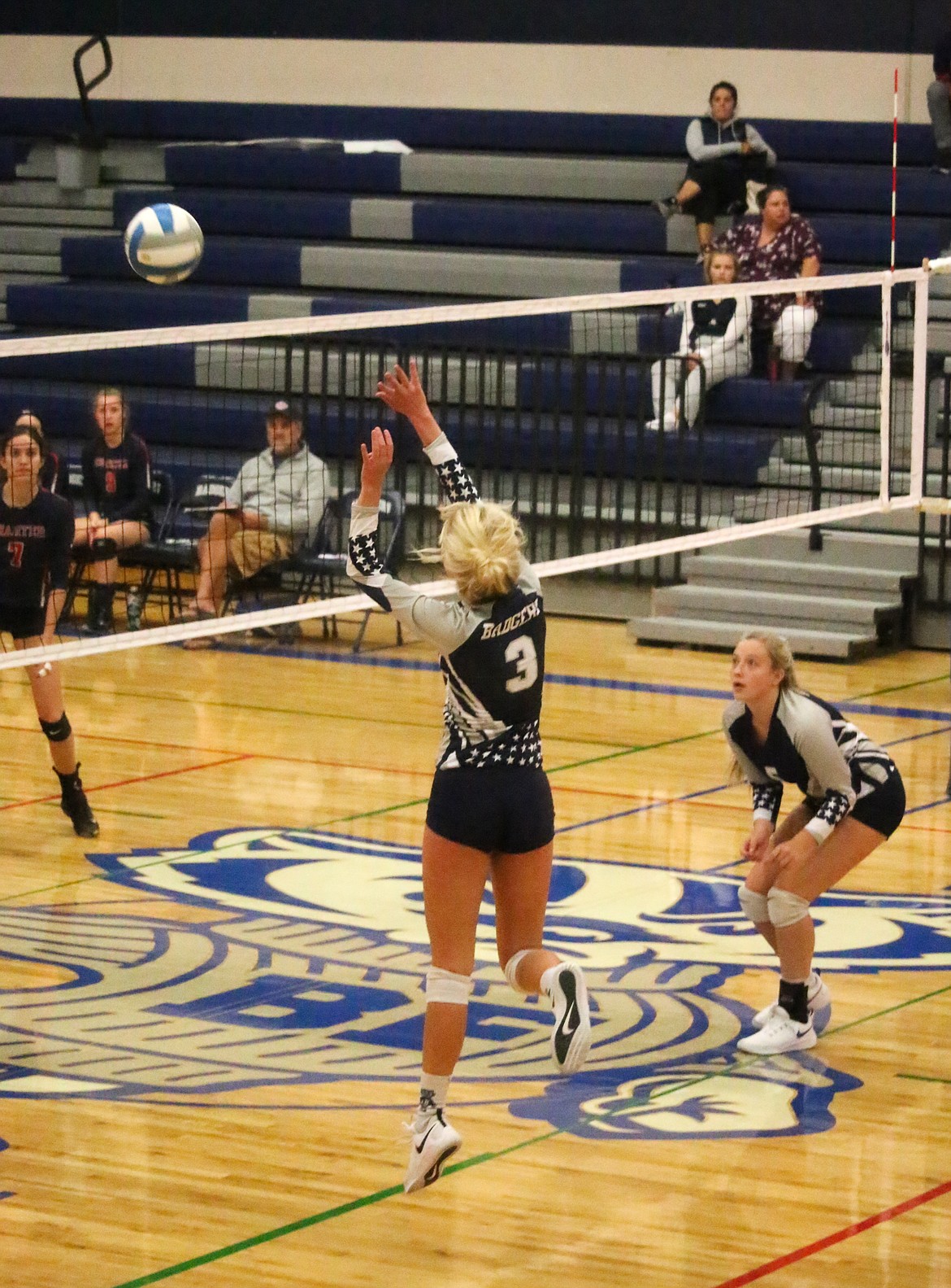 Photos by MANDI BATEMAN
Bonners Ferry&#146;s Avery Pluid hits the ball over the net during the Badgers&#146; recent home match against Coeur d&#146;Alene Charter.