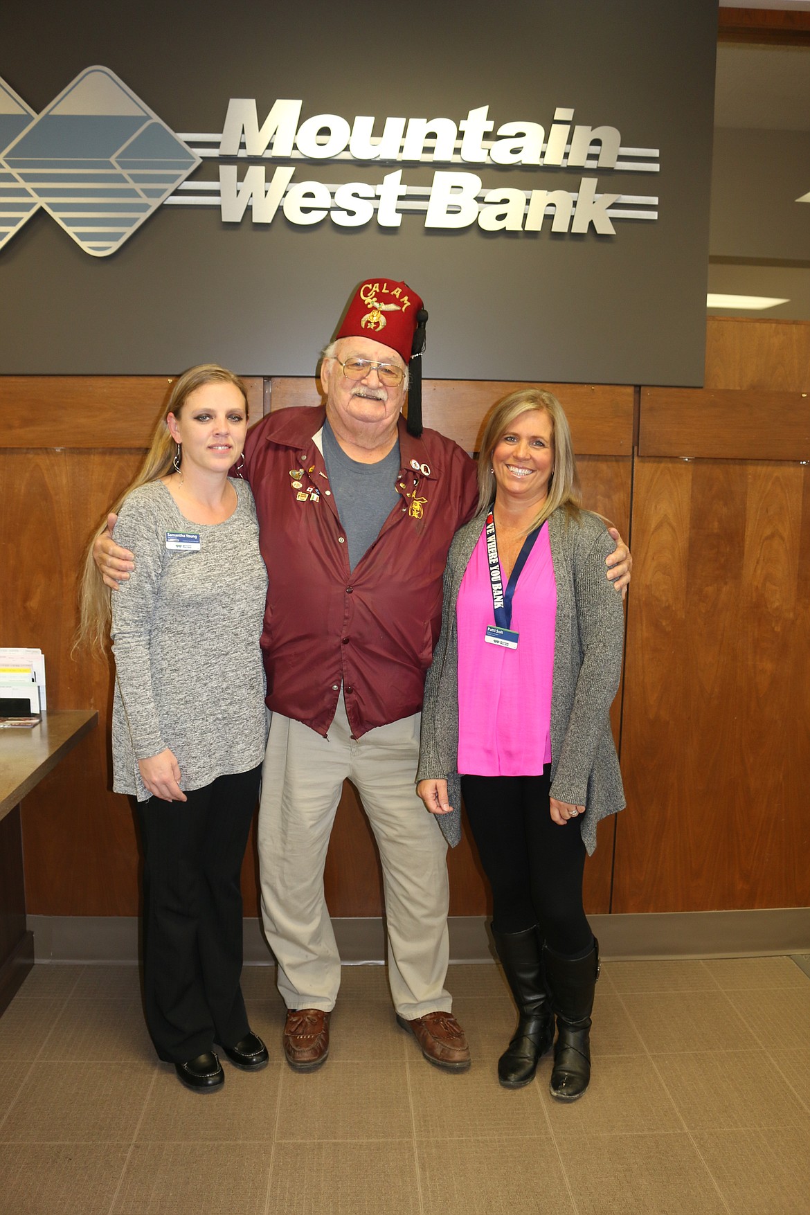 Samantha Young, Richard Hollenbeck and Patti Solt at Mountain West Bank.