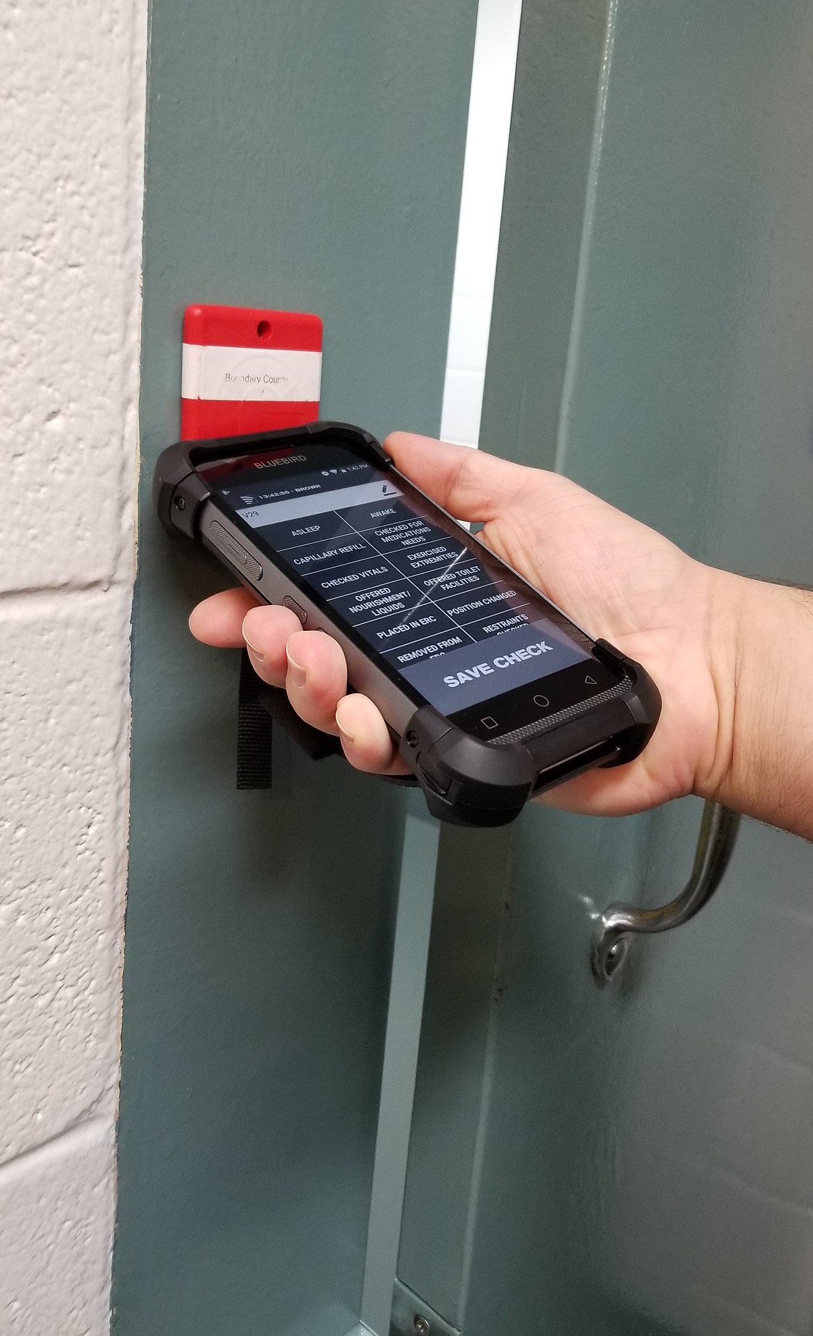 Photo by MANDI BATEMAN
The new Guardian RFID system checking in at one of the fixed tags that are throughout the jail.