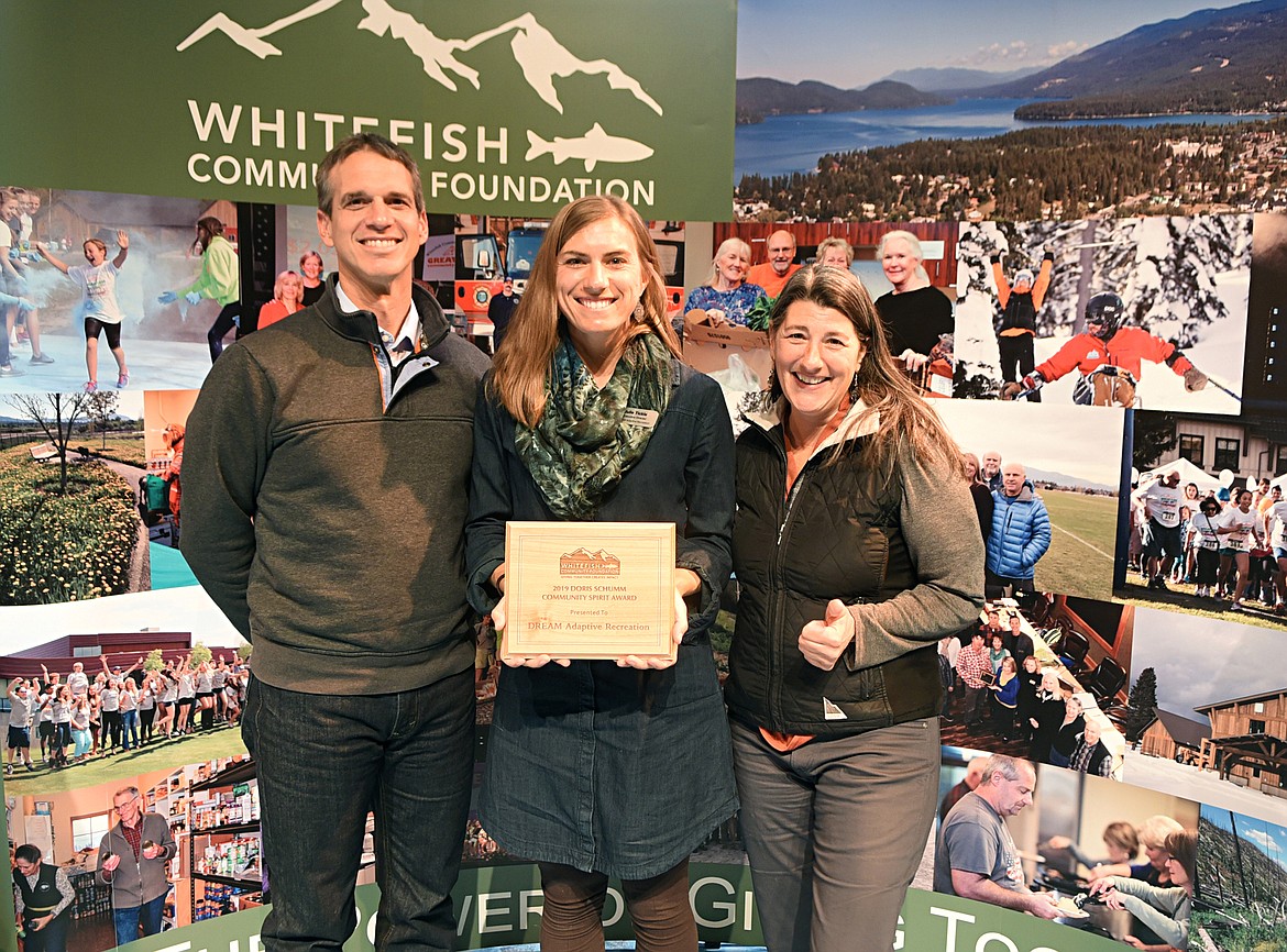 DREAM Adaptive Recreation earned the Doris Schumm Community Spirit Award Thursday during the Great Fish Community Challenge Awards Celebration. From left, representing DREAM was David Sandler, board secretary, Julie Tickle, executive director and Naomi Morrison, director of development. (Heidi Desch/Whitefish Pilot)