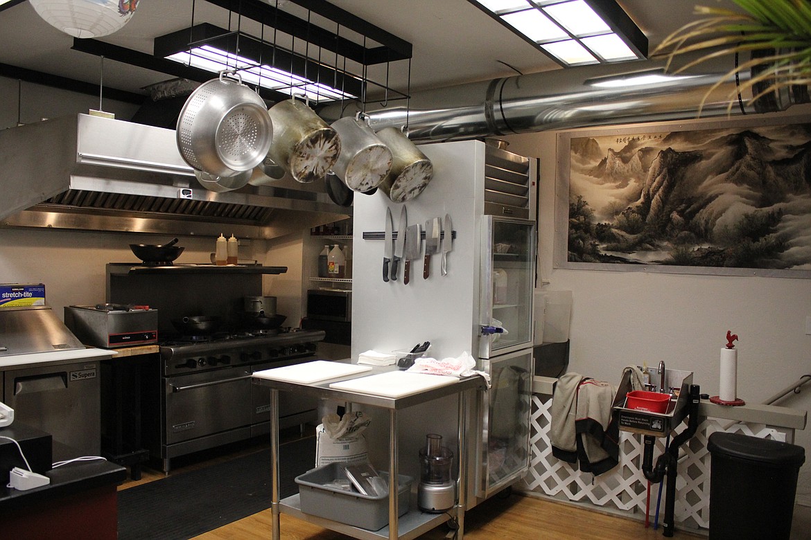 Photo by TONIA BROOKS
The 9b Pho Noodle Joint modern industrial kitchen area.